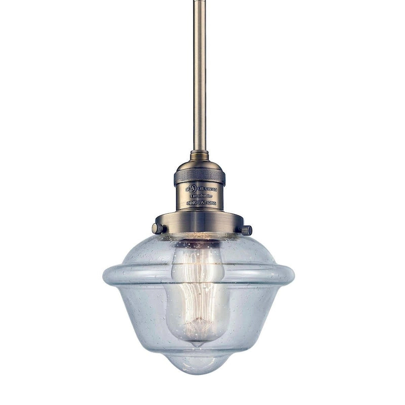 Suspension miniature Oxford Small à une lumière de 8 pouces de large, issue de la marque Innovations Lighting.