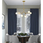 Suspension en fer doré à 6 lumières avec abat-jour en verre blanc